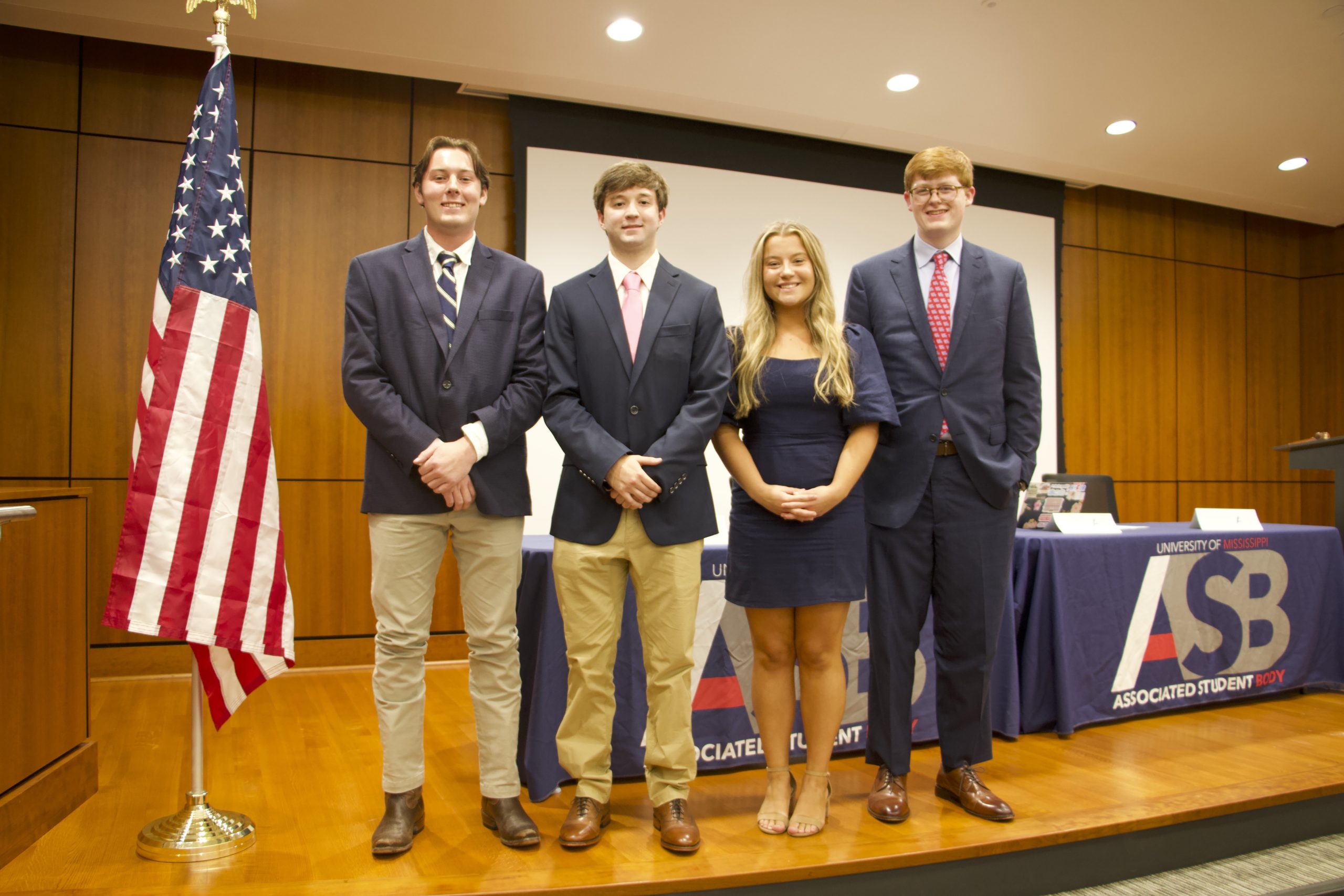 Andrew (A.J.) Heskett, Wils Davis, Kaylee Goff, and Jack Jones stand in front of ASB senate