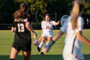 Taylor Radecki passes the soccer ball