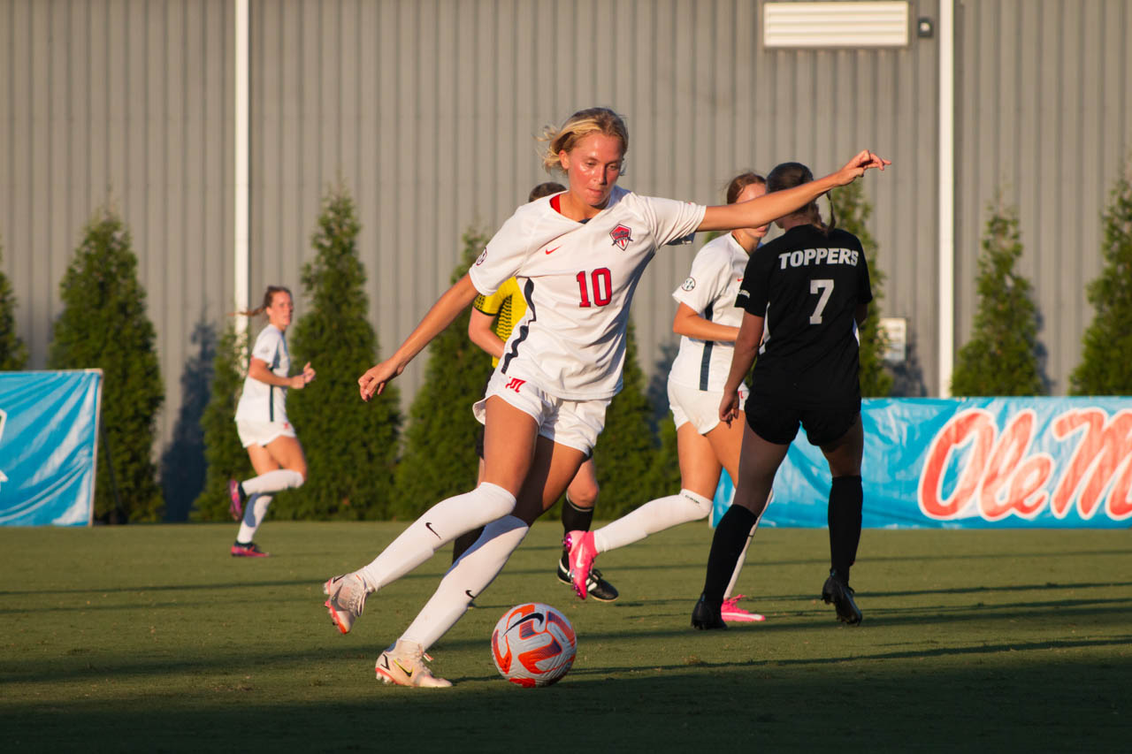 Lauren Montgomery passes the soccer ball